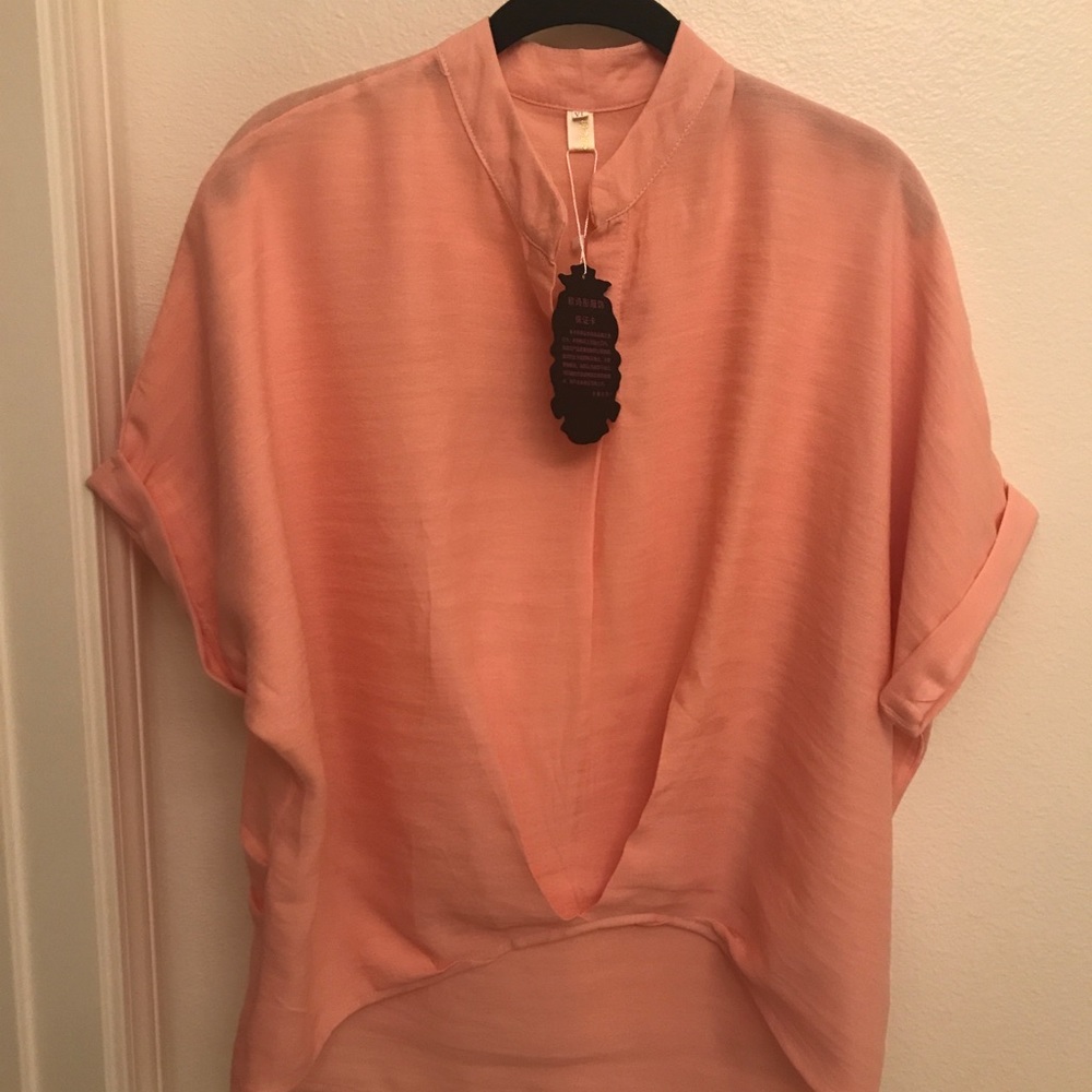 Pale tangerine high low top